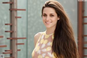 A woman with long brown hair wearing a white shirt.