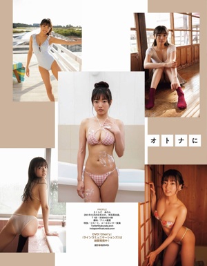 A woman in a pink bra and panties posing for the camera.